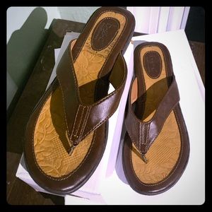 2/$20. Brown leather flip flops